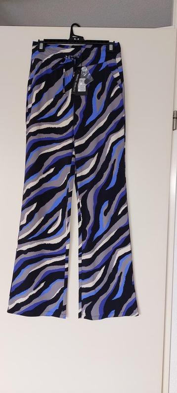 MI Piace travelbroek beschikbaar voor biedingen