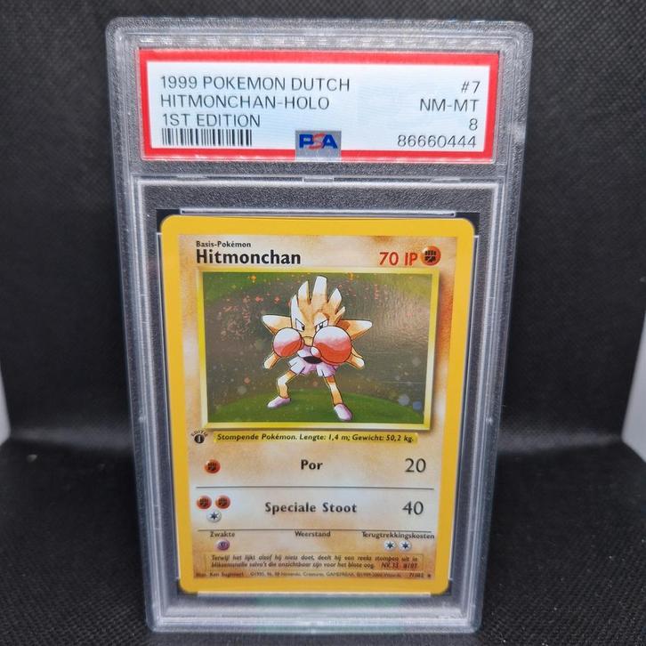Hitmonchan Holo 1st Edition NL PSA 8, Hobby en Vrije tijd, Verzamelkaartspellen | Pokémon, Zo goed als nieuw, Ophalen of Verzenden