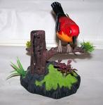 Vogeltje op tak dat zingt bij geluiden, Ophalen of Verzenden