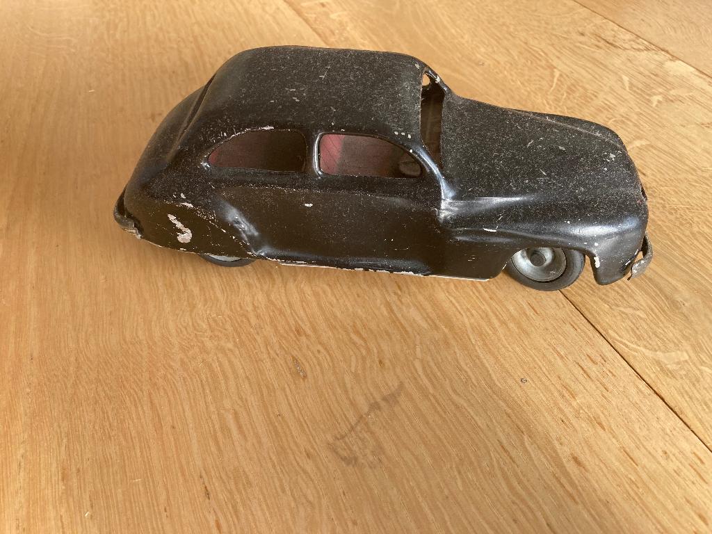 Antieke opwindbare speelgoed auto, Ophalen