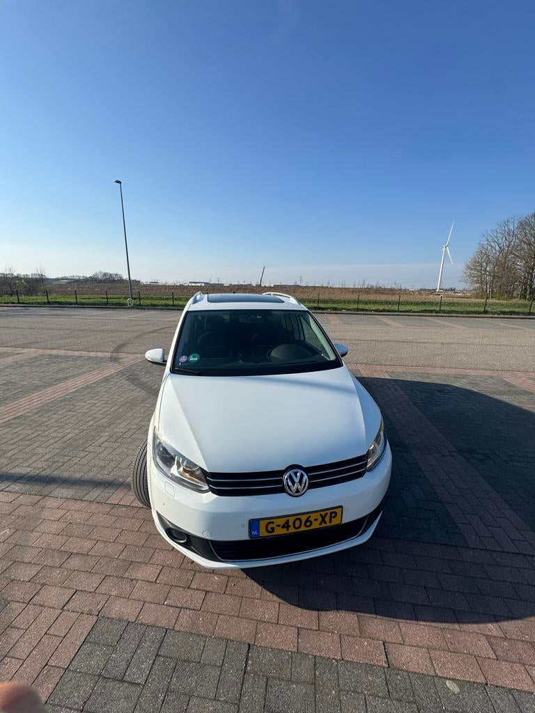 Volkswagen Touran Cup 1.2 TSI 77KW BMT 7P 2014 Wit, Auto's, Voorwielaandrijving, Navigatiesysteem, 4 cilinders, 7 stoelen