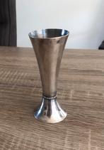 Verzilverd Vaasje, Ophalen