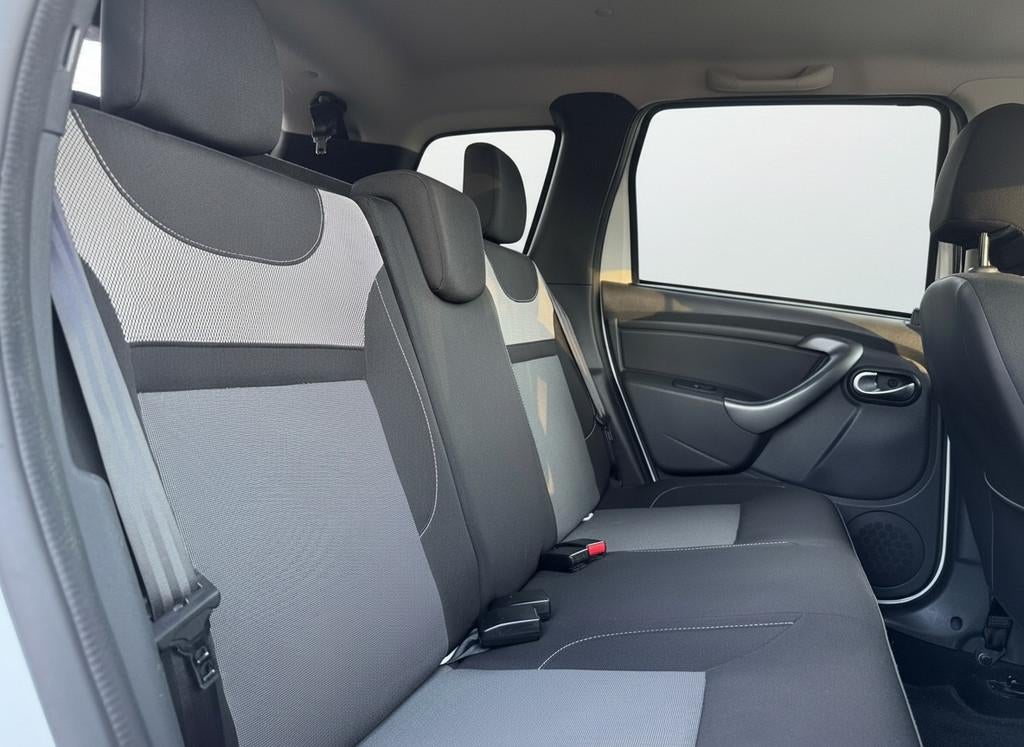 Dacia Duster 1.2 TCe 4x2 Prestige 125pk, Navi | Airco | Pdc, Auto's, Dacia, Stof, Gebruikt, Duster, 635 kg