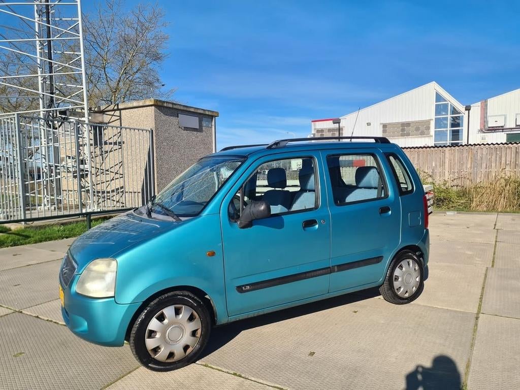 Suzuki Wagon R+ 1.3 AUT 2001 Groen, Auto's, Suzuki, 40 €/maand, 4 cilinders, 905 kg, 76 pk