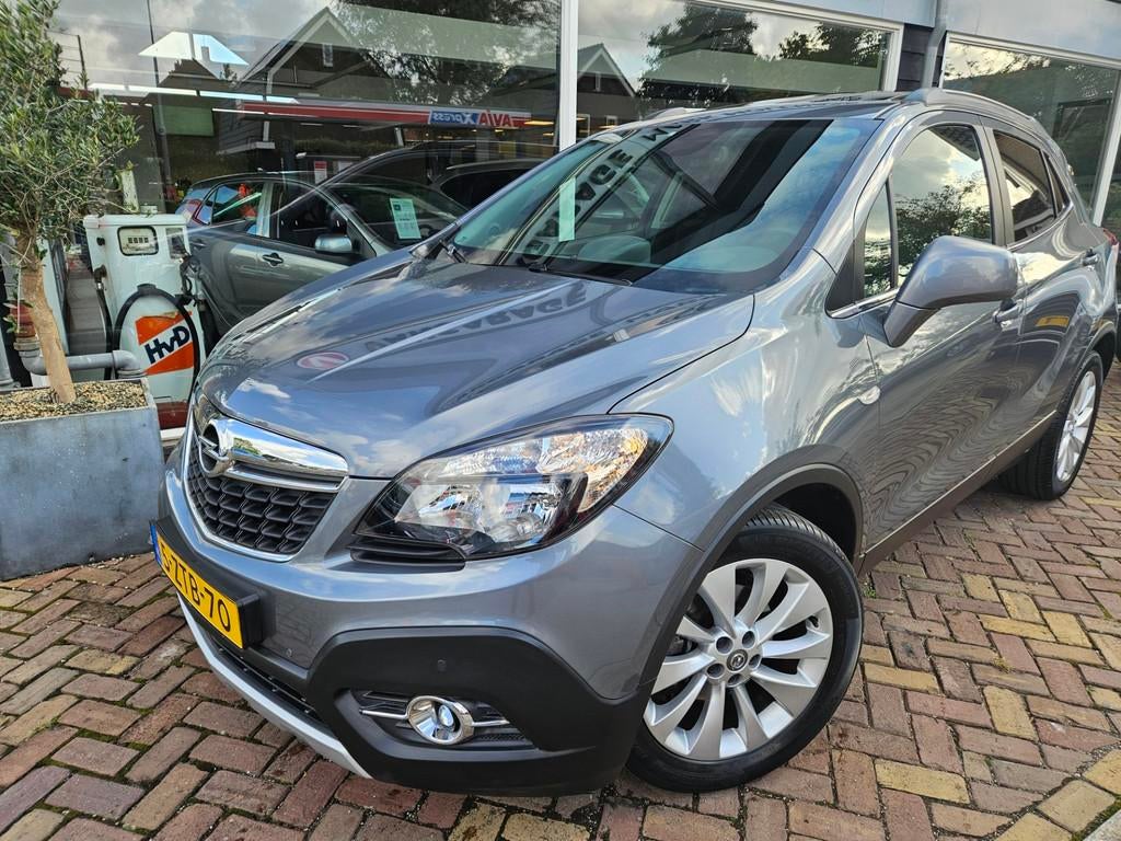 Opel Mokka 1.4 T Cosmo nederlandse auto!schuifkanteldak,lede, Auto's, Voorwielaandrijving, Euro 5, Gebruikt, 4 cilinders