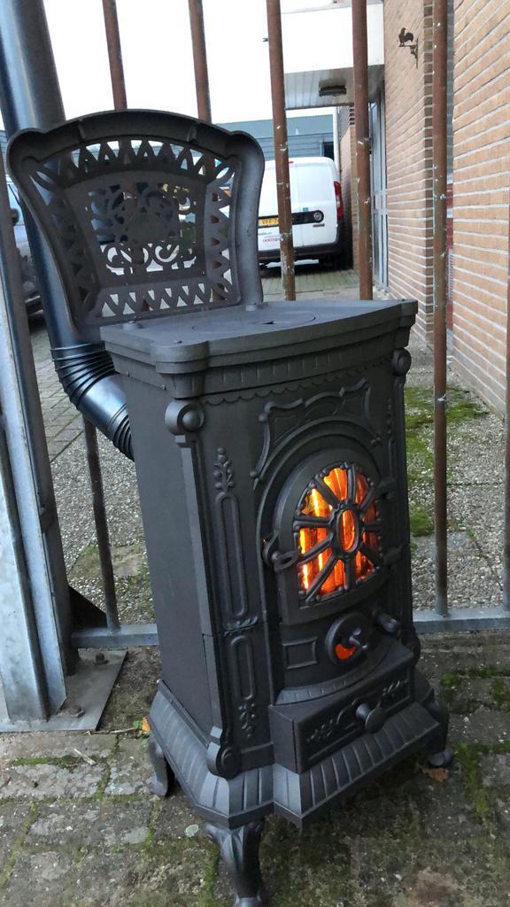 Super nette Thermocet rose houtkachel, Huis en Inrichting, Haarden, Zo goed als nieuw, Houthaard, Ophalen