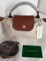 Longchamp Le Pliage mini inclusief schouderband!, Verzenden, Gebruikt, Beige, Handtas