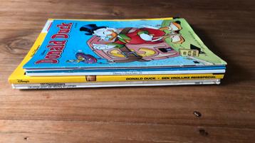 7 boeken/strips van Donald Duck beschikbaar voor biedingen