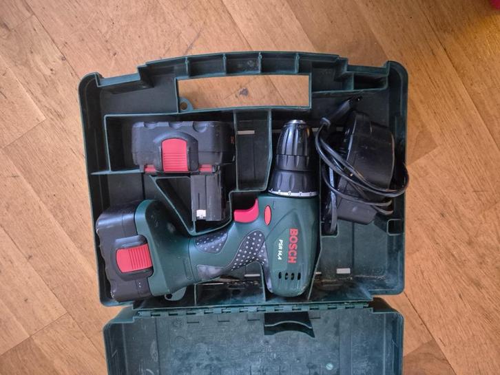 Accus en oplaader Bosch PSR 14.4, Doe-het-zelf en Verbouw, Gereedschap | Boormachines, Gebruikt, Boor- en Schroefmachine, Ophalen