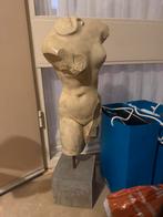 Stenen torso beeld, Ophalen