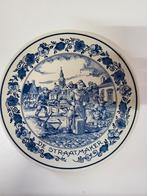 Delfts Blauw Bord de Straatmaker, Ophalen
