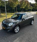 Mini Countryman 1.6 ONE 2010 Grijs, Auto's, Mini, Voorwielaandrijving, Stof, Zwart, 98 pk