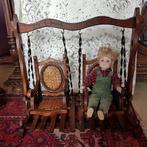 Antieke poppenschommel, Ophalen