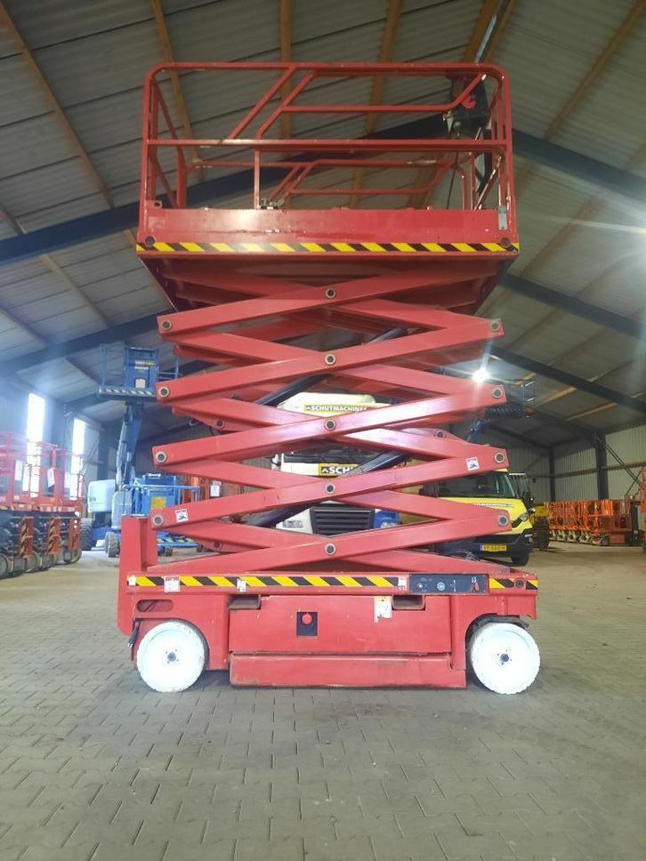 Haulotte compact 12 schaarhoogwerker hoogwerker, Zakelijke goederen, Machines en Bouw | Liften, Steigers en Ladders, Ophalen