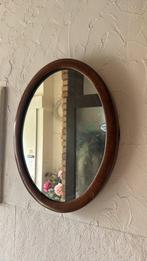 Ovale wandspiegel met houten lijst – warme houttint, Ophalen of Verzenden, Ovaal, 50 tot 75 cm, Minder dan 100 cm