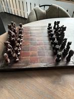 Afrikaans schaakspel van ebbenhout en padouk, Ophalen, Gebruikt