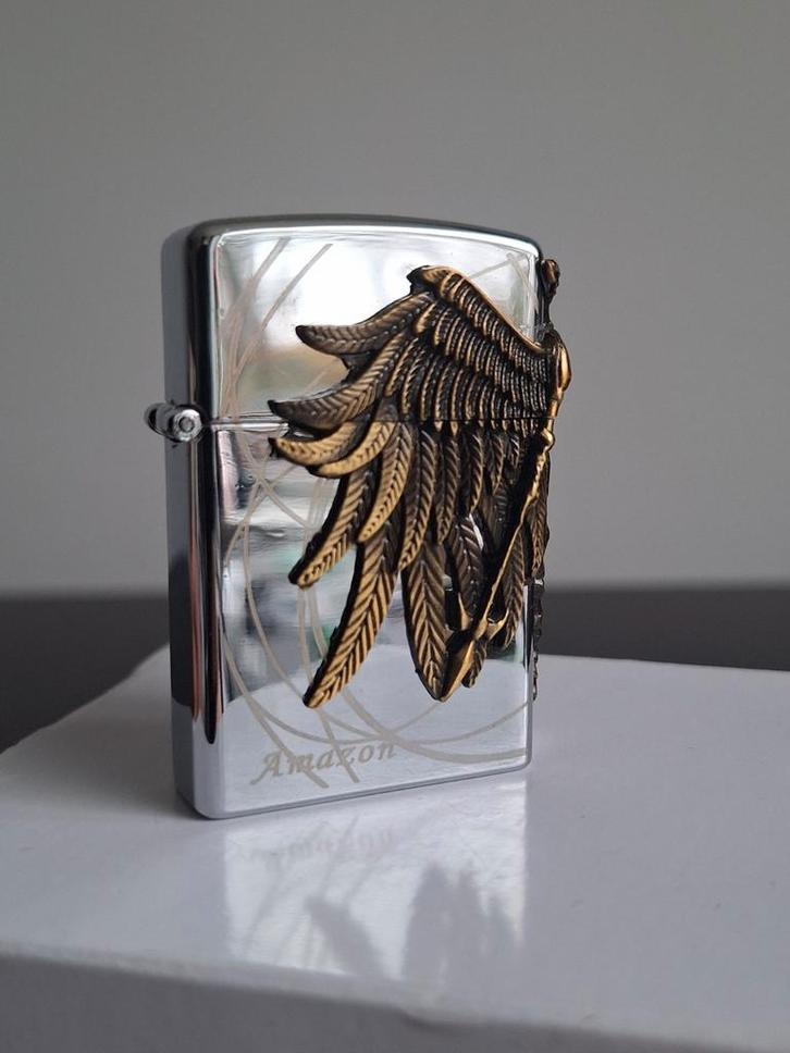 Zilveren Zippo met Gouden Valkyrie, Verzamelen, Rookartikelen, Aanstekers en Luciferdoosjes, Gebruikt, Aansteker, Ophalen of Verzenden