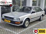 Nissan Bluebird 1.6 LX met STUURBEKRACHTIGING! (bj 1986), Auto's, Voorwielaandrijving, 82 pk, Bedrijf, Handgeschakeld