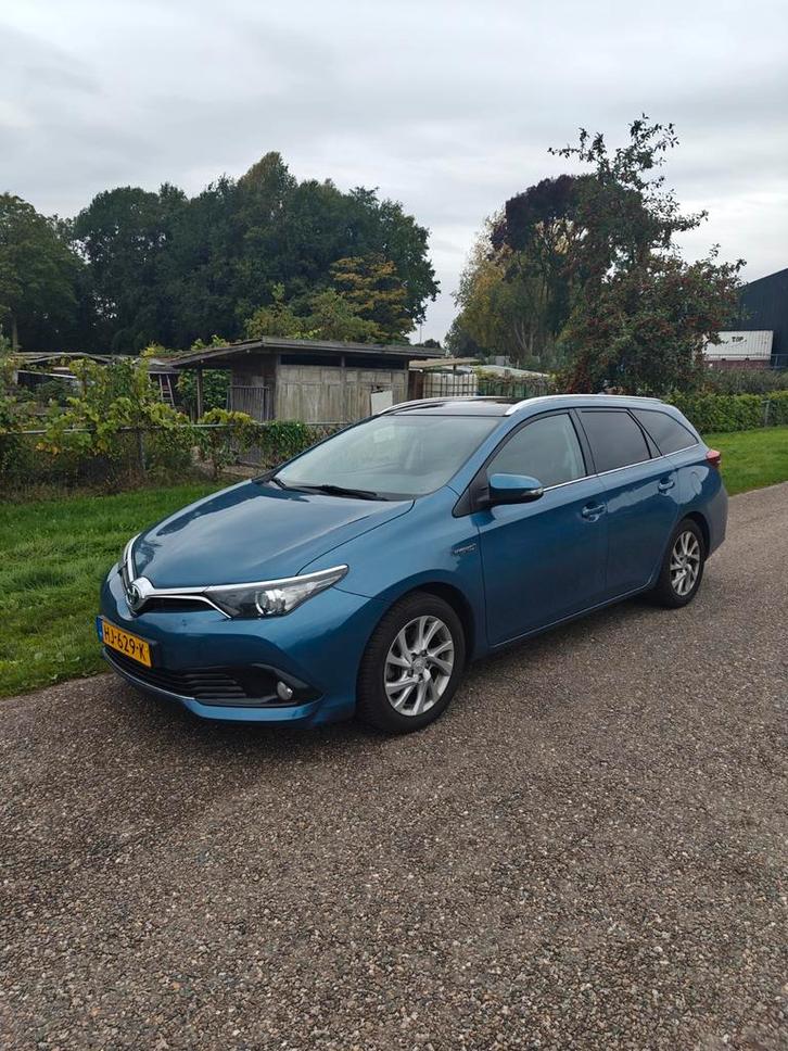 Toyota Auris 1.8 Hybrid Touring Sports CVT 2015 Blauw, Auto's, Toyota, Particulier, Auris, Achteruitrijcamera, Hybride Elektrisch/Benzine