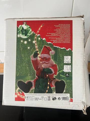 Klimmende kerstman beschikbaar voor biedingen