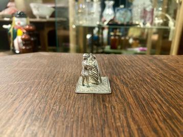 Zilver Miniatuur | De Uitbener  beschikbaar voor biedingen