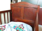 Houten kinderledikant, Ophalen