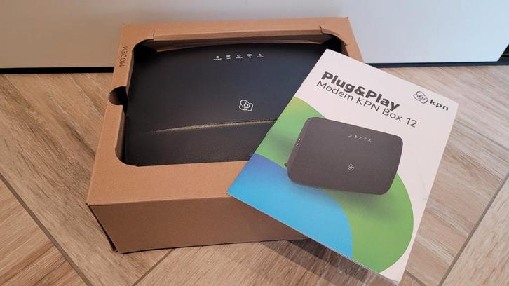 KPN 12b box router/modem, Computers en Software, Routers en Modems, Zo goed als nieuw, Router met modem, Ophalen of Verzenden