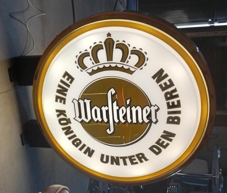 Grote verlichte café bord warsteiner diameter 88 cm., Verzamelen, Merken en Reclamevoorwerpen, Zo goed als nieuw, Lichtbak of (neon) lamp
