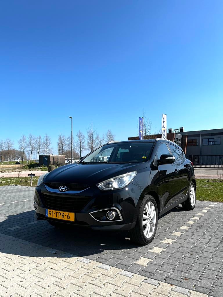 Hyundai iX35 2.0 2WD Automaat 2012 Zwart, Auto's, Hyundai, 1998 cc, Zwart, 4 cilinders, 75 €/maand