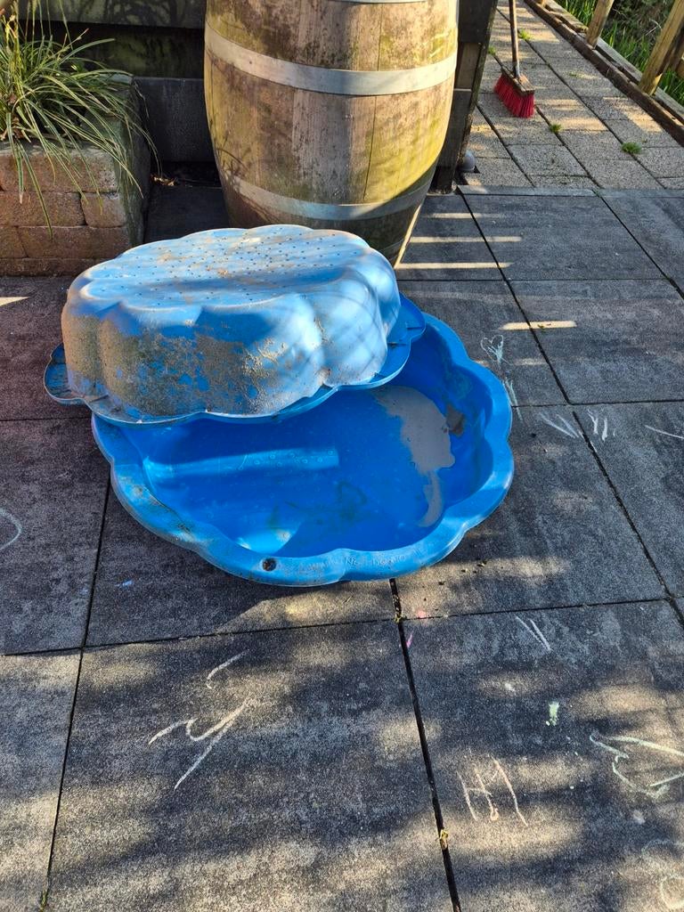 Schelp zandbak, Ophalen