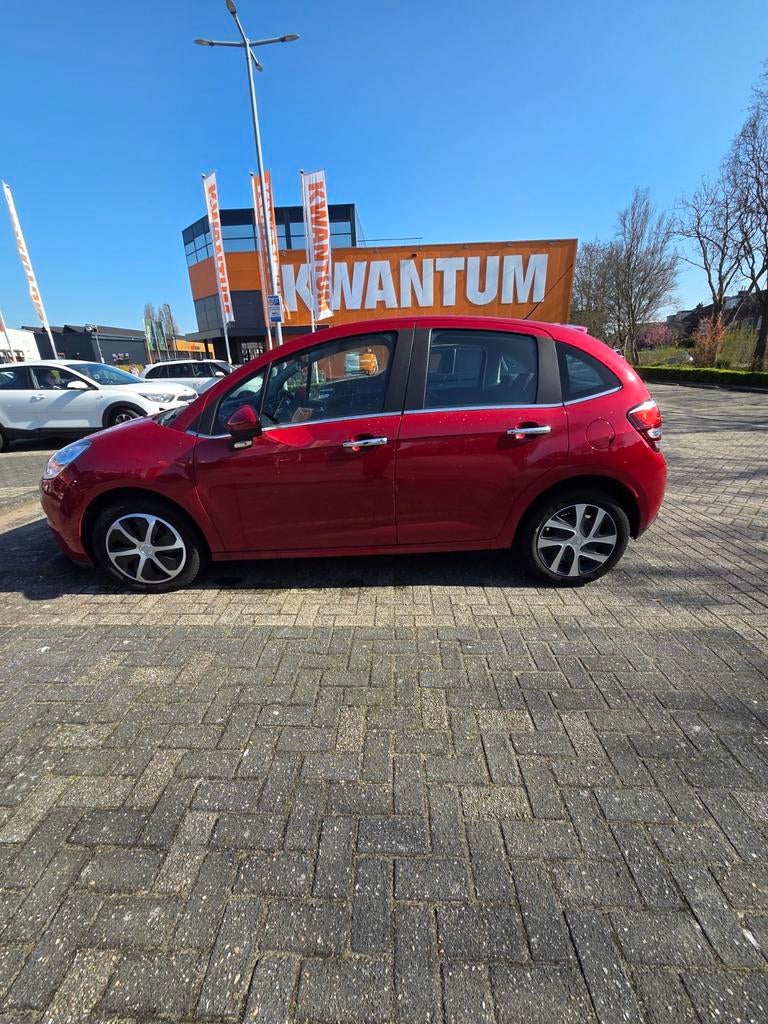 Citroën C3 1.2 Puretech S&S 82pk ETG 2016 Rood, 40 €/maand, 1199 cc, 23 km/l, Origineel Nederlands