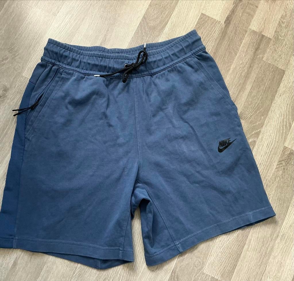 Nike korte broek met rits, maat M. Tech fleece, Ophalen of Verzenden, Gedragen, Maat 48/50 (M), Blauw