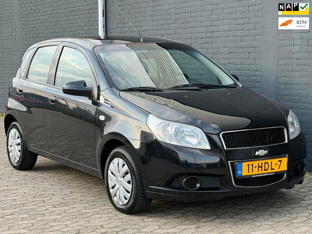 Chevrolet Aveo 1.4 16V LS AUTOMAAT AIRCO APK 5deurs, Aveo, 4 cilinders, 400 kg, Origineel Nederlands