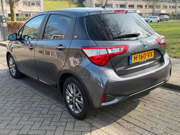 Toyota Yaris 1.5 Hybrid 100pk y20 5D Aut 2019 Grijs, Auto's, Toyota, Particulier, Yaris, ABS, Achteruitrijcamera, Adaptieve lichten