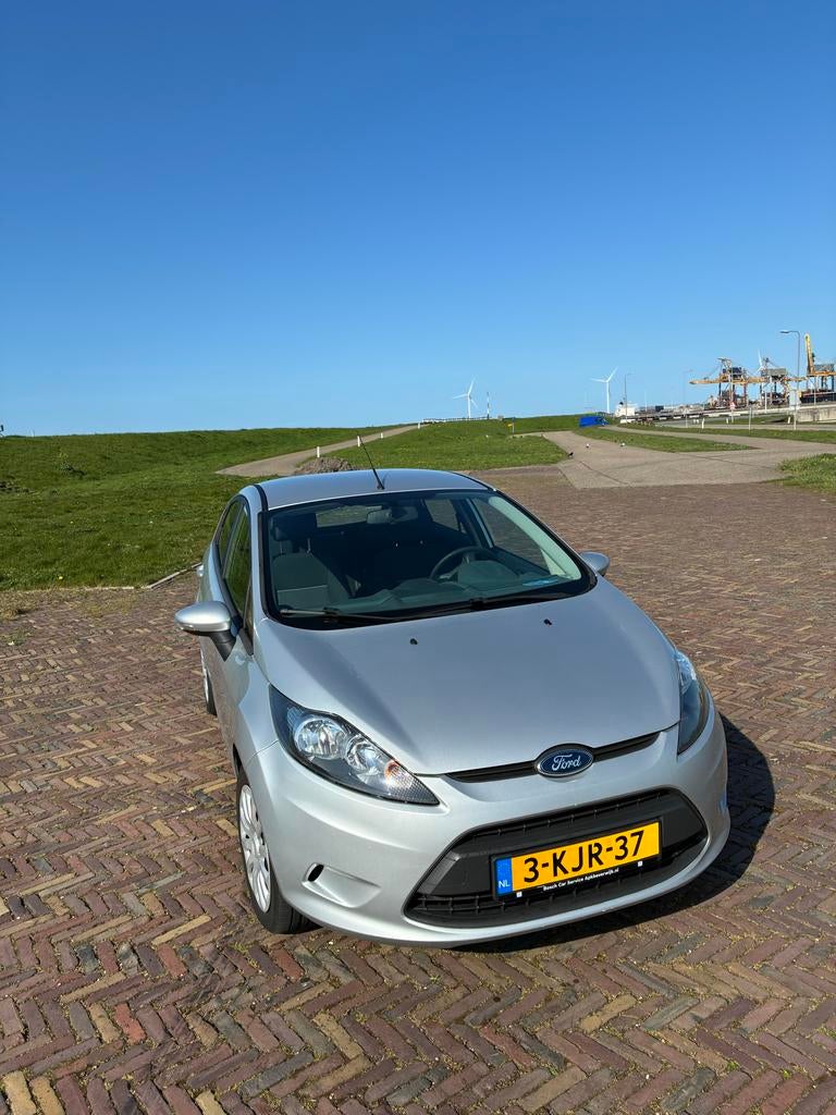 Ford Fiësta 1.25 60KW 5DR 2011 Grijs, Auto's, Voorwielaandrijving, 1242 cc, Handgeschakeld, Particulier