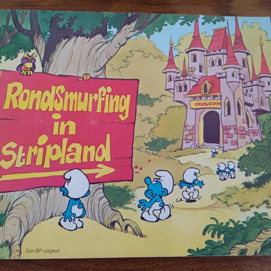 Rondsmurfing in Stripland plakplaatjesalbum, Ophalen of Verzenden, Gebruikt