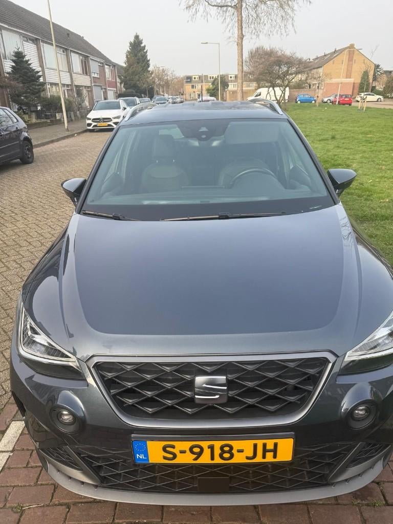 Seat Arona 1.0 TSI 95pk 2023 Grijs, Auto's, Voorwielaandrijving, Parkeersensor, 1114 kg, Arona