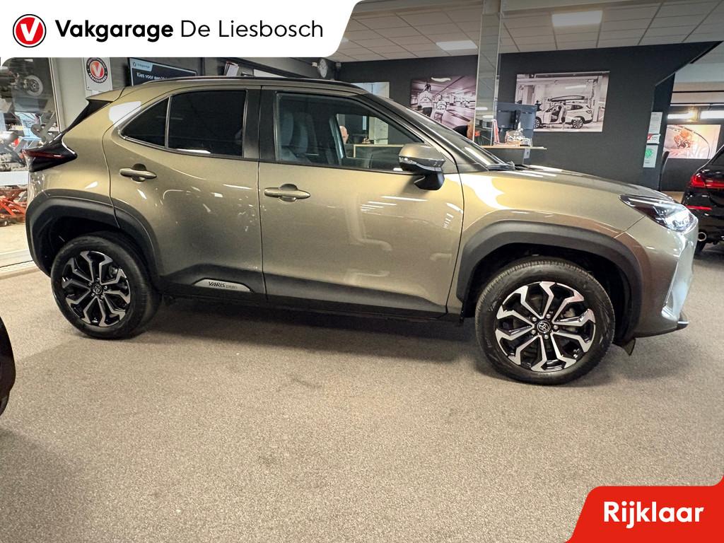 Toyota Yaris Cross 1.5 Hybrid Dynamic/navi / panoramadak / c, Stof, Gebruikt, 1490 cc, Bedrijf