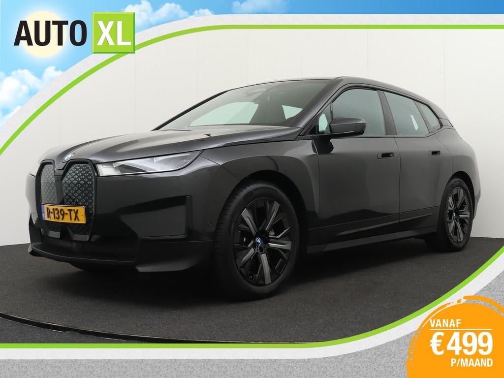 BMW iX xDrive40 Shadow Line 77 kWh (98% SOH) Pano-dak Adap.C, Auto's, BMW, Automaat, Gebruikt, Zwart, Vierwielaandrijving
