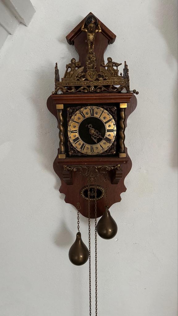 Zaanse klok, Ophalen