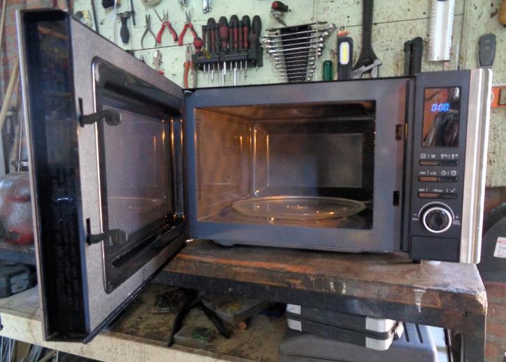 ETNA magnetron model no ESM223 RVS, Witgoed en Apparatuur, Magnetrons, Gebruikt, Vrijstaand, Magnetron, 45 tot 60 cm, Draaiplateau