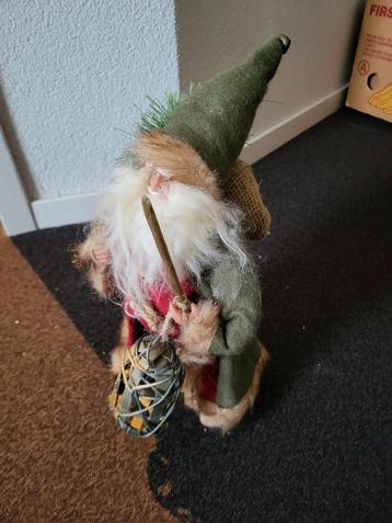Kerstman in het groen beschikbaar voor biedingen