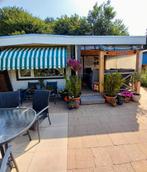 Te koop mooie houten chalet op camping Wisentbos in Dronten