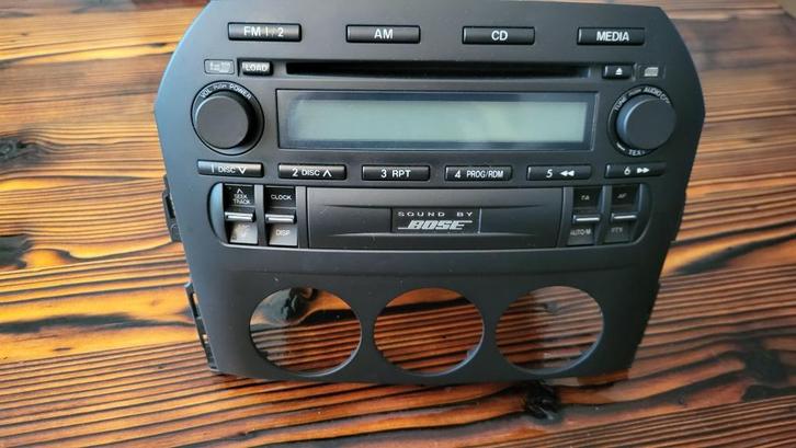 Mx5 nc1 originele Bose radio unit, Auto diversen, Autoradio's, Zo goed als nieuw, Ophalen of Verzenden