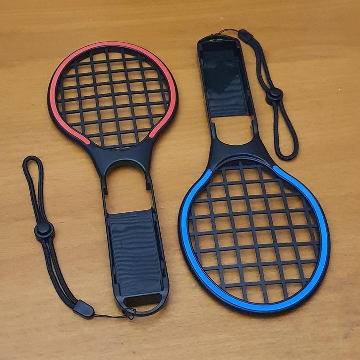 Switch Set van 2 Tennisrackets Blauw en Rood, Spelcomputers en Games, Games | Nintendo Switch, Gebruikt, Sport, 2 spelers, Vanaf 7 jaar