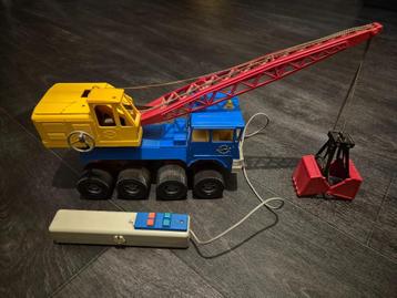Gama Faun / Demag kraan met grijper beschikbaar voor biedingen