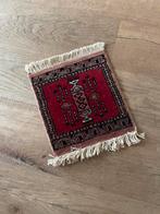 Perzisch tapijtje, Ophalen