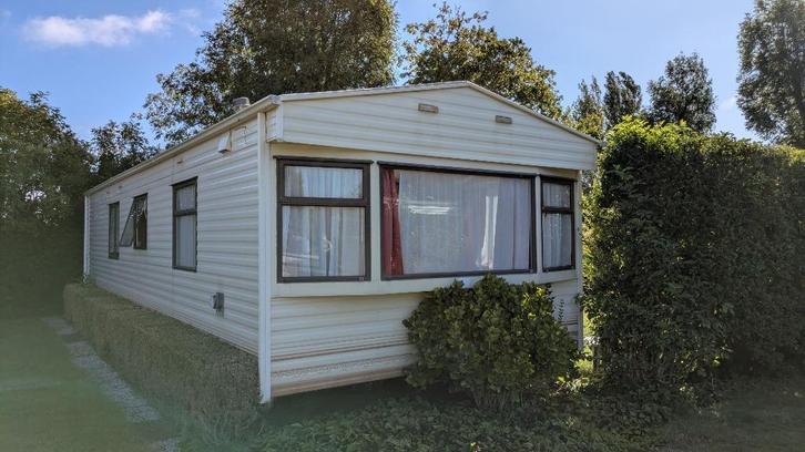 Ruim chalet met 2 toiletten, Caravans en Kamperen, Stacaravans, tot en met 4, Ophalen