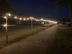 Palen Kastanjehout lampjes zonnedoek schutting afrastering