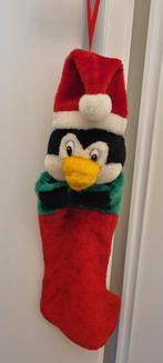 Kerstsok met Pinguïn, Ophalen